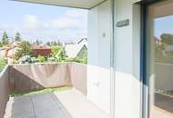Sonnige Wohnung mit Blick ins Grüne, Balkon und Garage!