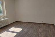 NEUER PREIS: Renovierte Wohnung mit sonniger Terrasse!