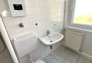 Günstige Starterwohnung in herrlicher Grünlage: praktische 1-Zimmerwohnung mit heller Wohnküche und separatem Schlafzimmer im kleinen Mehrparteienhaus – ideal für Singles, Studierende oder Pendler!