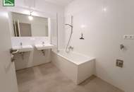 Moderne 3-Zimmer-Dachgeschosswohnung in idealer Lage! Karmeliterhof - Neubauwohntraum beim Rathausplatz