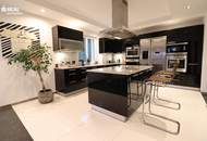 Luxuriöses Wohnen: Designhaus mit Garten, Pool und geräumiger Garage