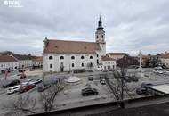 3-Zimmer-Dachgeschosswohnung mit Blick auf die Kirche – Top-Lage am Hauptplatz in Bruck an der Leitha