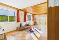 Wohnqualität und Raumvielfalt – gepflegtes Zweifamilienhaus mit Gartenidylle