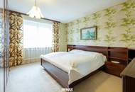 Stilvolles Ein- Zweifamilienhaus mit Doppelgarage und großen Garten