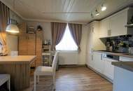 Bauernhaus mit Nebengebäude und Feldern in Durchham