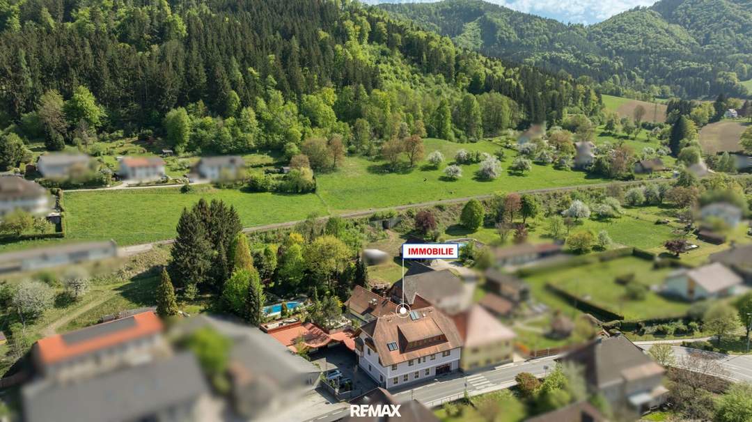 Wohnen, arbeiten und investieren in Bestlage: Exklusive Wohn-/Gewerbeimmobilie mit Pool, parkähnlichem Garten und großem Entwicklungspotenzial in St. Paul