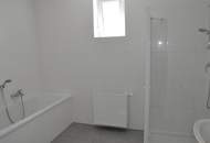 Moderne 4-Zimmer-Wohnung mit Eigengarten, in zentraler Lage und absoluter Seenähe!