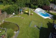 Einfamilienhaus mit Pool und großem Garten in verkehrsgünstiger Lage
