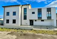 ERSTBEZUG! Geräumige Eigentumswohnung im Obergeschoss mit Balkon und größer Dachterrasse