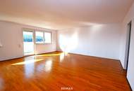 Großzügige Dachgeschosswohnung mit 3 Terrassen und Fernblick ins Grüne