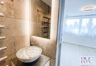 Hochwertig sanierte, sehr ruhige 2-Zimmer-Wohnung mit Balkon, Weitblick & Tiefgarage in Salzachnähe