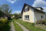 Einfamilienhaus mit viel Platz, sonnigem Garten, Terrasse und Nebengebäude!