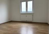 Erdgeschoßwohnung mit Gartenanteil in zentraler Lage