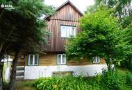 Altes Stein-Holzblockhaus mit großem Garten in idyllischer Lage - perfekt für Naturliebhaber und Golfer!