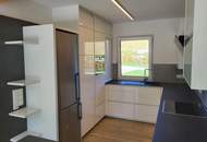 Neuwertiger Bungalow mit großem Grundstück