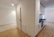 Sonnwendviertel: 1-Zimmer-Wohnung mit Balkon in der 16. Etage – Fitnessraum, Co-Working &amp; Rooftop-Terrasse inklusive!
