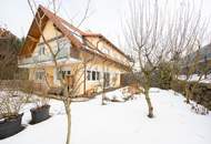 Hochwertige 3-Zimmer-Wohnung mit Tischlerküche, 160 m² Eigengarten, Terrasse und Garage in ruhiger, grüner Lage!