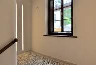 Moderne 3-Zimmer-Wohnung mit charmantem Wintergarten in traumhafter Liegenschaft!