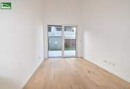 3.Zimmer-Erstbezug in Hofruhelage mit einer atemberaubenden Raumhöhe und Garten - sofort beziehbar in Nähe der U1 (Nettopreis). - WOHNTRAUM