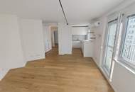 stylische 55m² Dachgeschosswohnung | 2 Zimmer | 23m² Terrasse mit Süd-West Blick | Klimaanlage & Außenjalousien