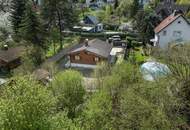 „Wohnen im Einklang mit der Natur – Stilvolles Holzhaus in traumhafter Ruhelage auf unverbaubarem Grundstück“