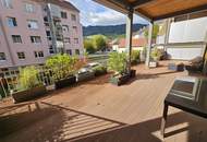 Familienhit! Traumhafte 4 - Zimmer Wohnung mit 63 m² südseitiger Terrasse und Carport