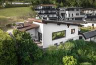 Bestlage mit Ausblick: Dieser hervorragend gelegene Bungalow begeistert durch seine exklusive Position und einen unvergleichlich schönen Fernblick!