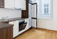 Renditestark investieren: Drei kernsanierte Wohnungen mit Gewerbenutzung in zentraler Lage!