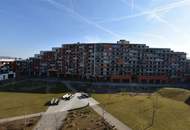 Top vermietete Anlegerwohnung mit Balkon und Tiefgarage - Neuwertig!