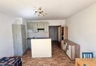 Wohnung mit Loggia und Tiefgaragenplatz direkt im Ortszentrum