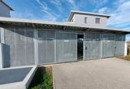 Top Eigentumswohnung mit Terrasse, Eigengarten und zwei Tiefgaragenstellplätzen