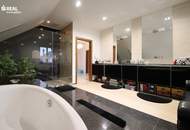 Luxuriöses Wohnen: Designhaus mit Garten, Pool und geräumiger Garage