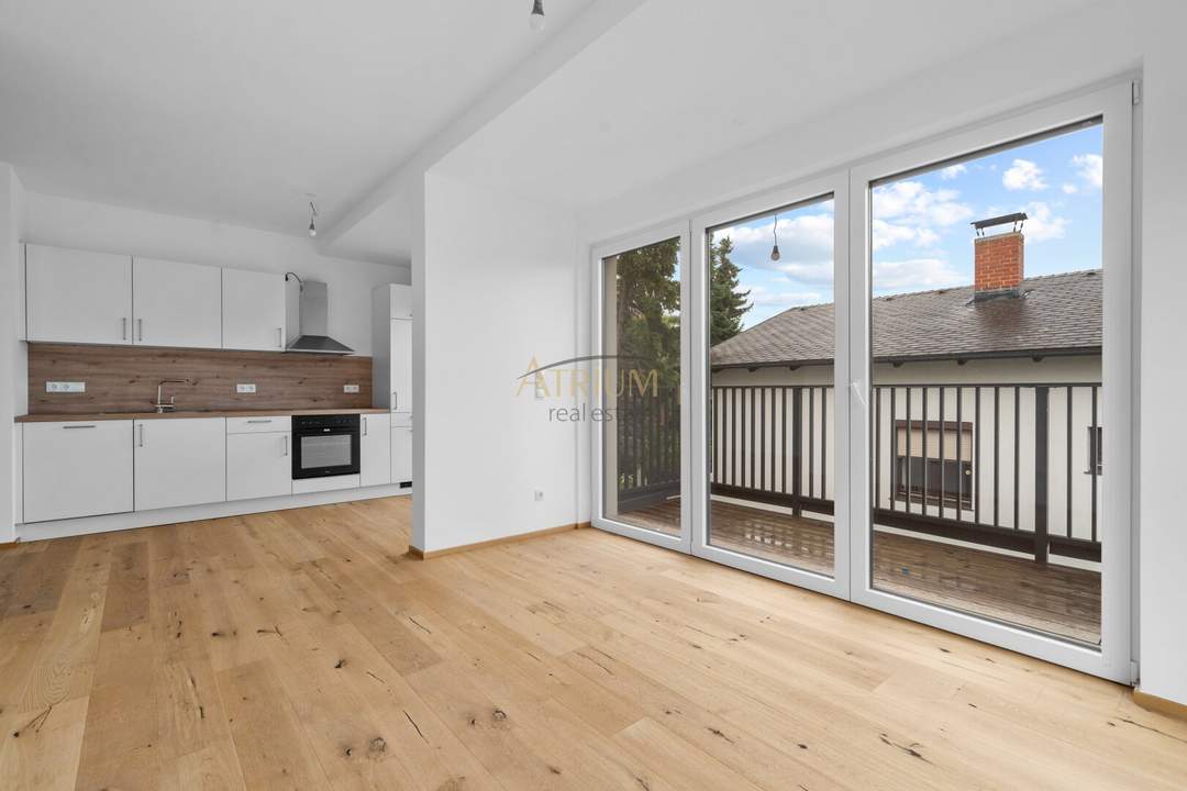 Ruhige Grünlage eine echte Wohlfühloase.🌳 Angenehme Atmosphäre machen diese Lage zu einem kleinen Paradies🌅.Erstbezug – moderne 2-Zimmer-Wohnung mit Balkon & Fernblick - Auf Baurechtsgrund errichtet!