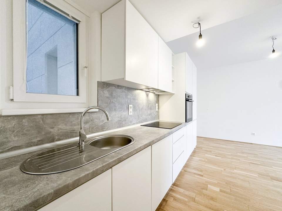 Traumhafte 2-Zimmer-Wohnung mit Balkon und Gemeinschafts-Dachterrasse