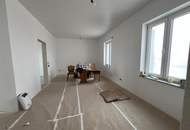 Traumhafte 4-Zimmer Wohnung mit Garten und ausbaubarem Dachgeschoss