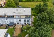 Zuhause im Grünen – Lichtdurchflutete Maisonette mit Gartenoase und Wasserblick