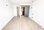 Hochwertig sanierte, sehr ruhige 2-Zimmer-Wohnung mit Balkon, Weitblick & Tiefgarage in Salzachnähe