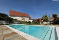 Luxus pur im historischen „Freihof“: Exklusives Penthouse mit Blick auf die Donau und Weingärten, mit großem Garten &amp; Pool sowie Parkplatz