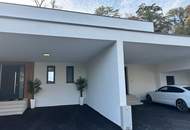 Neu gebaute Doppelhaushälfte mit großem 3fachcarport in beliebter Siedlung