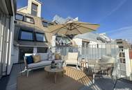 BEIM DONAUUFER: Erstbezug: Klimatisierte Dachgeschosswohnung mit ruhigem Hofbalkon