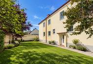 Ein Haus, viele Möglichkeiten | Großzügiges Zuhause mit zwei Wohnebenen und Ausbaureserve | 2 Küchen | Separate Eingänge | Garten mit viel Privatsphäre