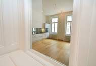 Großzügige Altbauwohnung mit kleinem Balkon in repräsentativen Stilaltbau