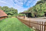 Außergewöhnliche Haushälfte vor den Toren Wiens mit enormem Potential