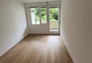 Erstbezug: Elegante Gartenwohnung mit Outdoor Pool