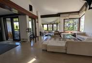 1170 AM HEUBERG: GROßZÜGIGER FAMILIENWOHNSITZ MIT INDOORPOOL, WELLNESS, GARTEN &amp; WIEN-BLICK