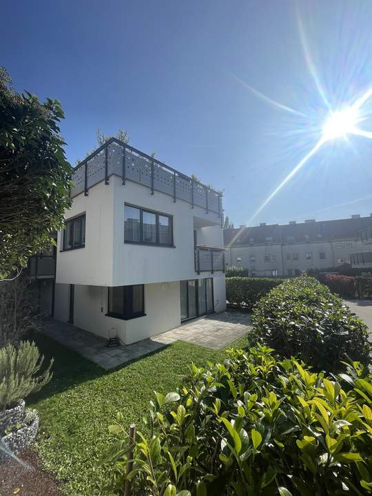Moderne zentrumsnahe Erdgeschosswohnung mit großem Garten