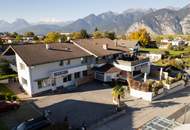 Liegenschaft mit Wohnungen- und Gewerbeeinheiten