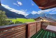 Schlitters: Kernsanierte Dachgeschosswohnung mit Südbalkon, Garten und traumhafter Aussicht