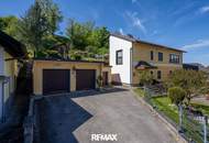Gepflegtes Einfamilienhaus mit 2 Wohneinheiten, Garten/Terrasse &amp; 3 Garagen in sonnige Ruhelage!