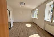 Helle 1-Zimmer-Wohnung mit Parkplatz in zentraler Lage zu vergeben!